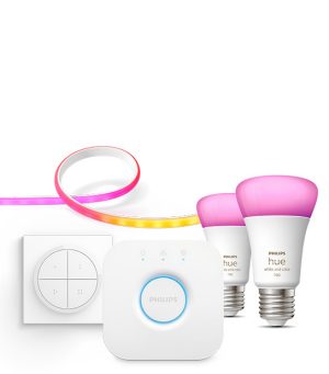 A Philips Hue smart lighting starter kit including strip light, smart LED bulbs, smart switches, and a Hue Bridge smart light hub. 