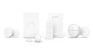 Various Hue smart switches and buttons on a white background